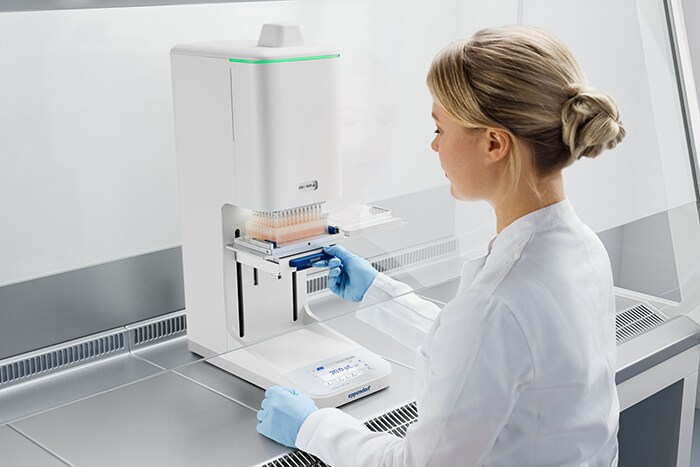 Scientist using the epMotion™ 96 flex